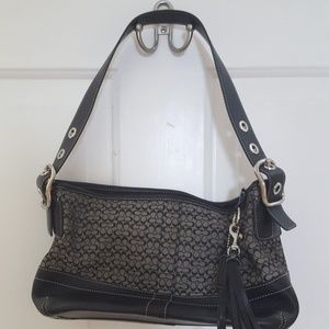 Coach Signature C purse with leather Tassel